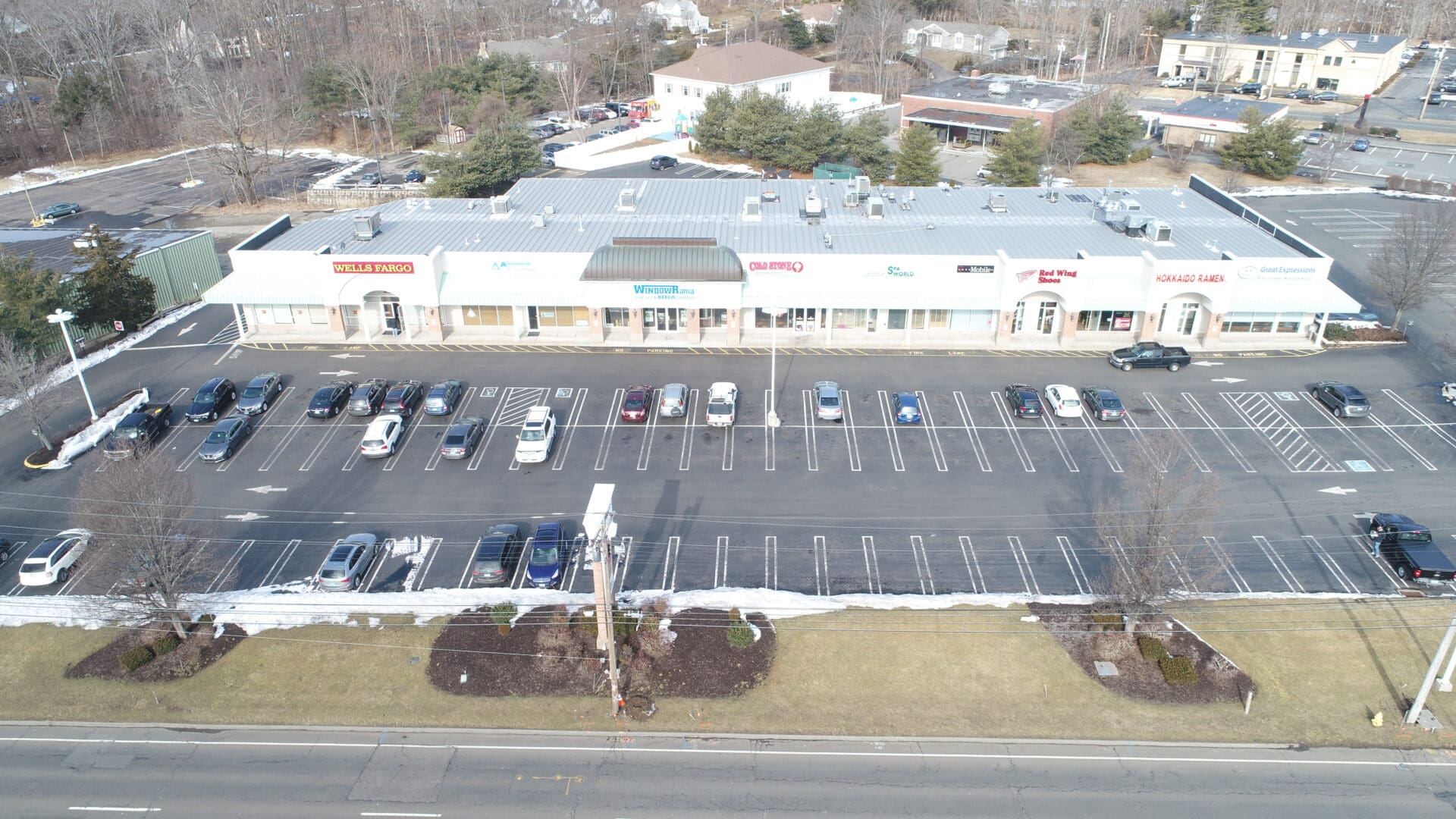 A parking lot with cars parked in it